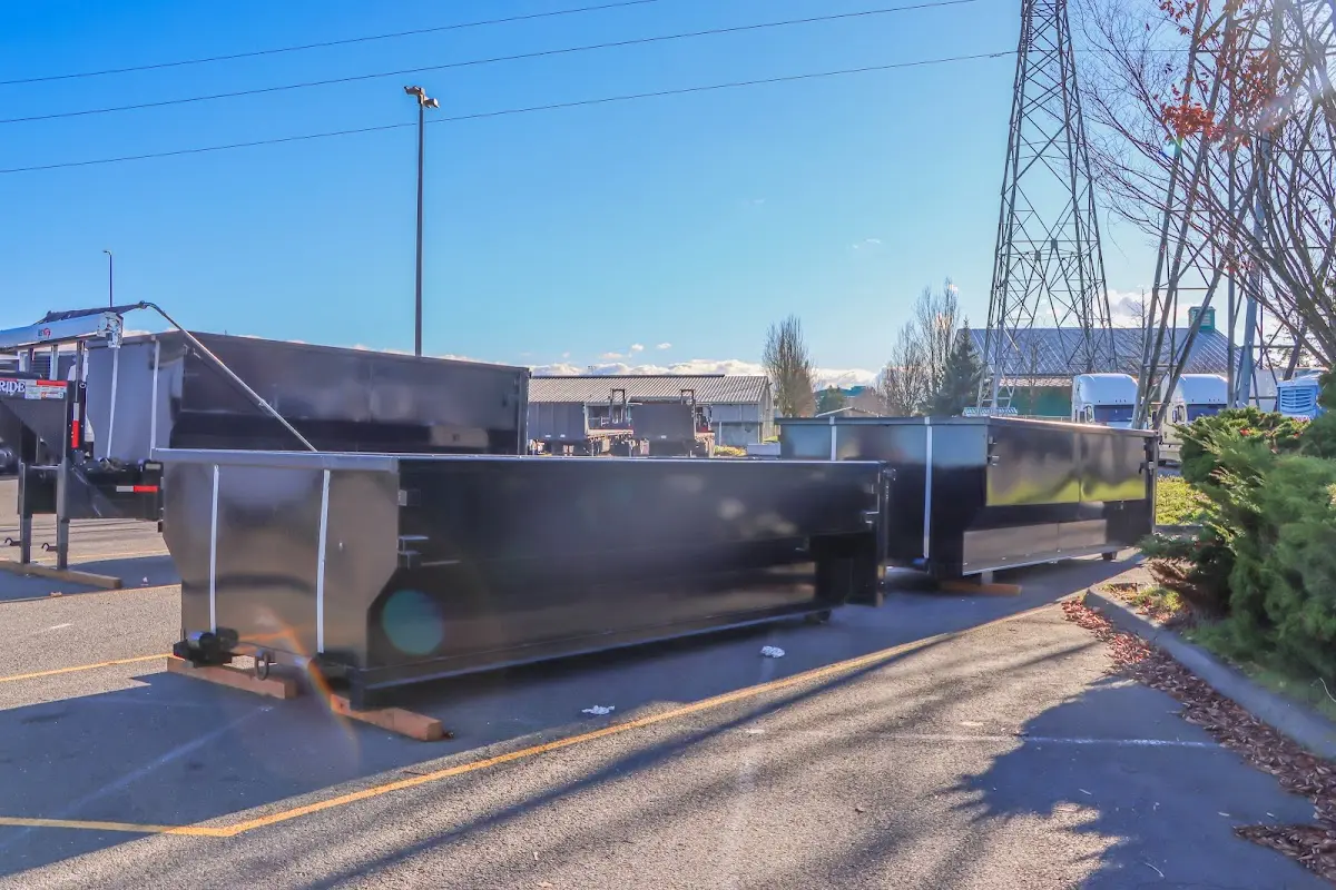 Roll-off dumpster ready for waste disposal at job site for Concrete Dumpster Rental in Sandy Oaks